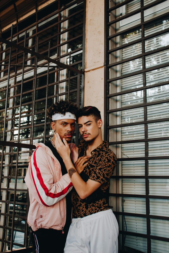 pexels-photo-2619264-2619264 A glamorous photoshoot featuring a fashionable gay couple posing together in an urban setting.